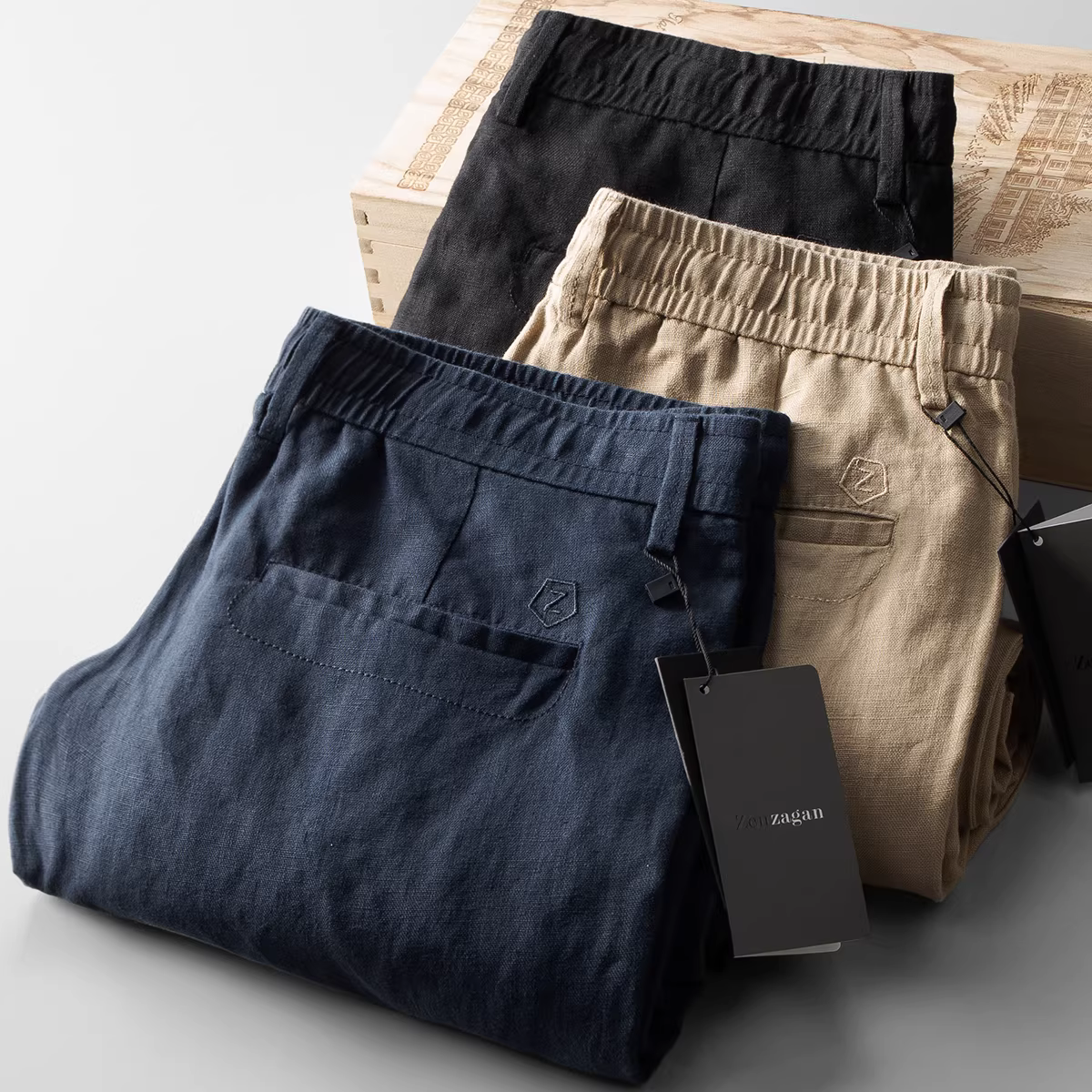 Quần vải lanh mùa hè dành cho nam, quần dài lưng thun thêu chữ, quần cotton-lanh dáng rộng thẳng mỏng