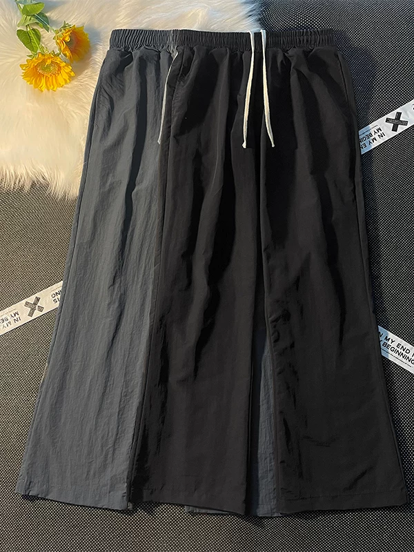 Quần dài mùa hè mỏng, nhanh khô, kiểu dáng thường ngày dành cho nam, dáng rộng, hơi loe, phong cách thời thượng, quần dù thể thao đường phố.