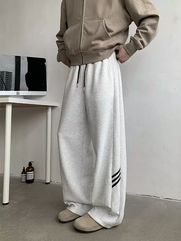 Quần thể thao sọc kẻ sọc cỡ lớn dành cho nam, quần dài phong cách retro Mỹ, quần cặp đôi rộng rãi hợp thời trang, đa năng cho mùa xuân và mùa thu.