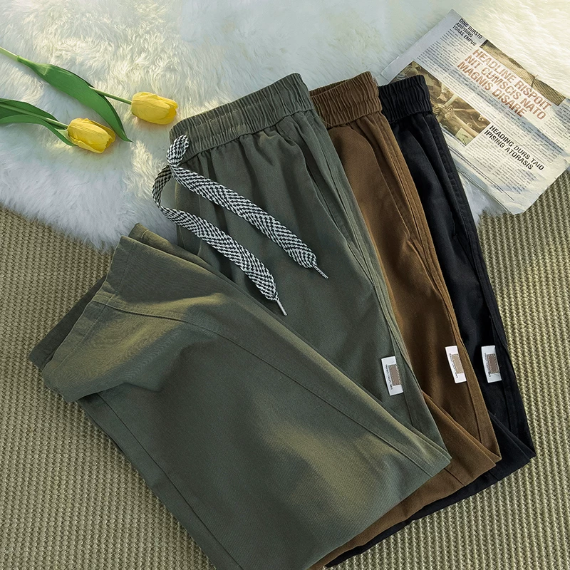 Quần công sở phong cách tối giản kiểu Nhật cho mùa xuân hè, quần ống đứng đa năng của thương hiệu thời thượng, quần dài ống rộng dáng rộng thông thường dành cho nam.