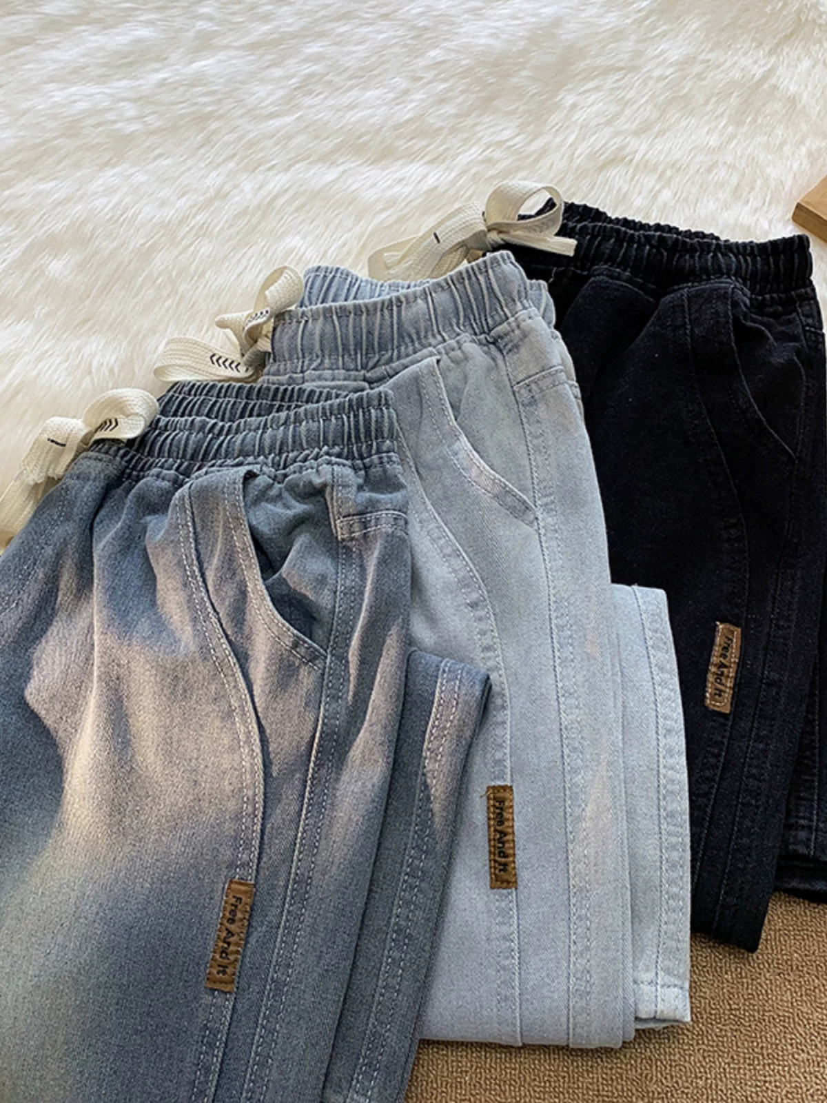 Quần jeans lưng thun chất liệu denim, kiểu dáng thời trang, phong cách trẻ trung dành cho nam giới, mùa xuân thu, kiểu Nhật, dáng rộng, ống thẳng, dài.