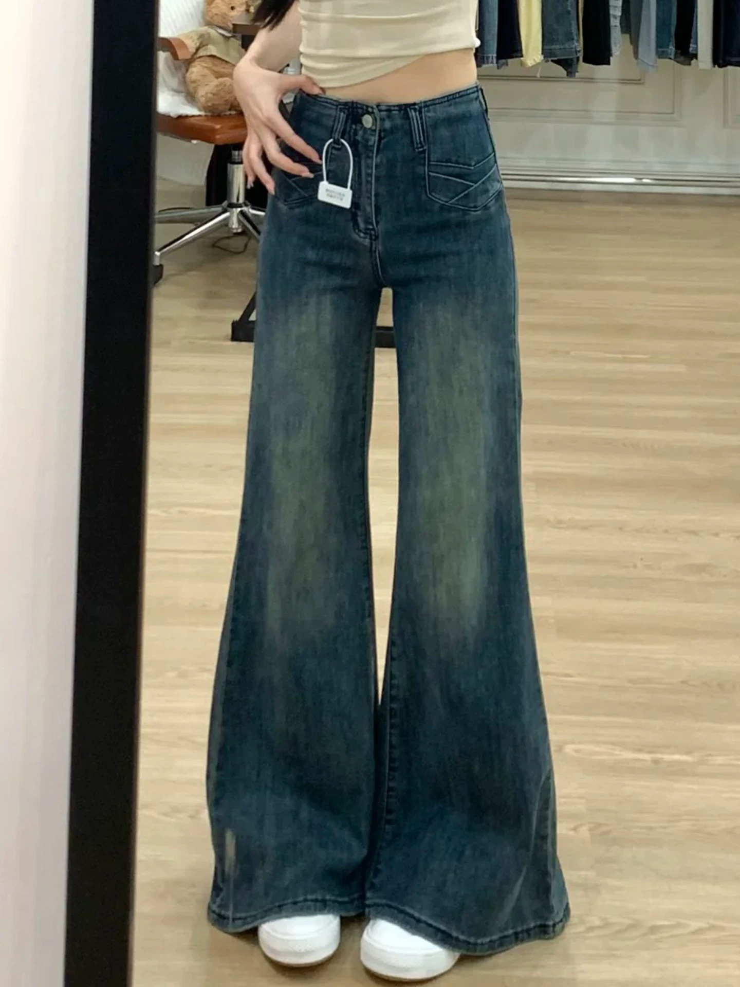 Quần jean ống loe lót lông mềm mại La Chapelle dành cho nữ, kiểu mới thu đông 2025, quần ống chuông cạp cao dáng nhỏ nhắn.