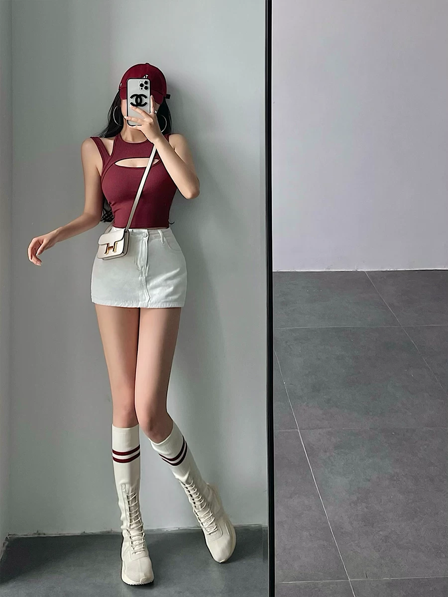 YoungGirlDay Váy ngắn denim chống lộ eo cao gợi cảm phong cách Mỹ dành cho cô gái nóng bỏng.