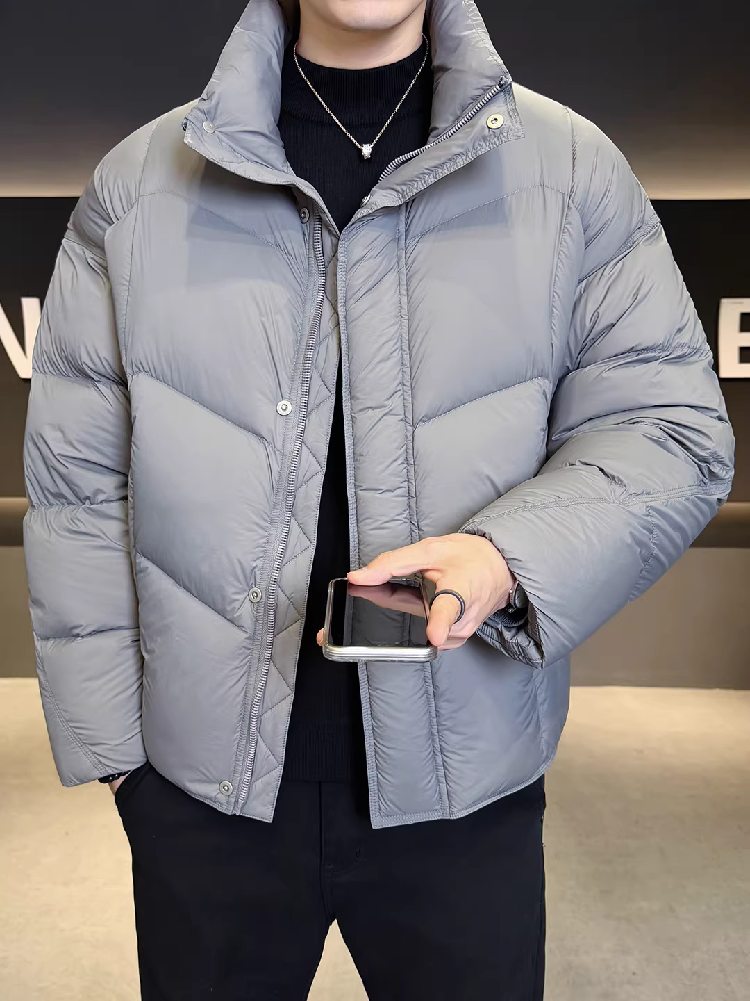 Áo khoác phao nam mùa đông 2025 dáng rộng nhẹ, cổ đứng, tiêu chuẩn quốc gia, độ phồng 90
