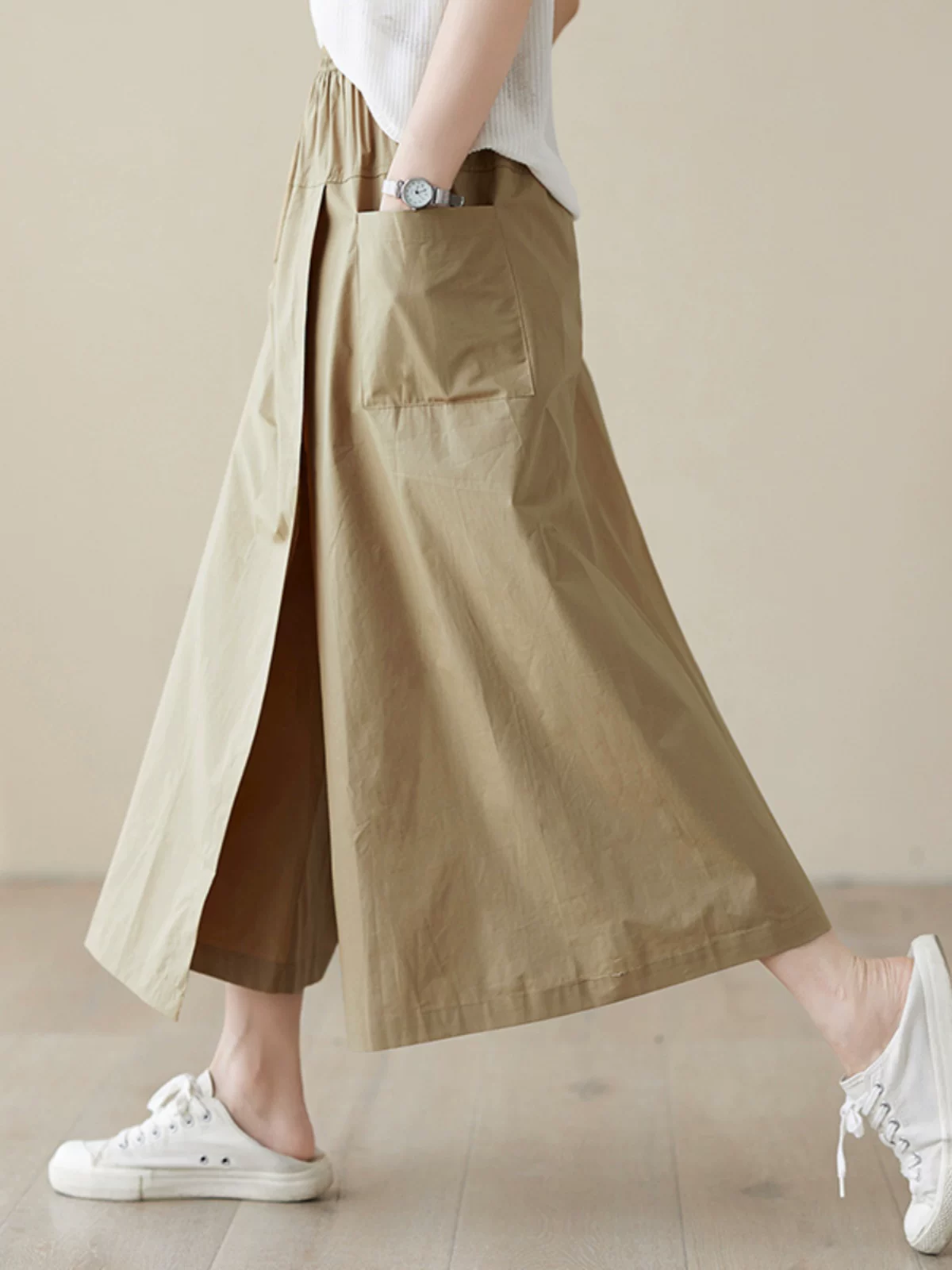 Quần váy nghệ thuật bằng vải cotton và vải lanh mới mùa hè 2026 dành cho nữ, váy chữ A có dây rút kiểu trang phục công sở, váy xòe cạp cao, đa năng.