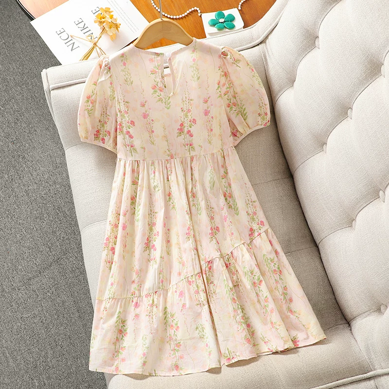 Váy hè bé gái 2025 kiểu dáng mới họa tiết hoa phong cách đồng quê chất liệu cotton size trung và lớn quần áo trẻ em váy công chúa bé gái