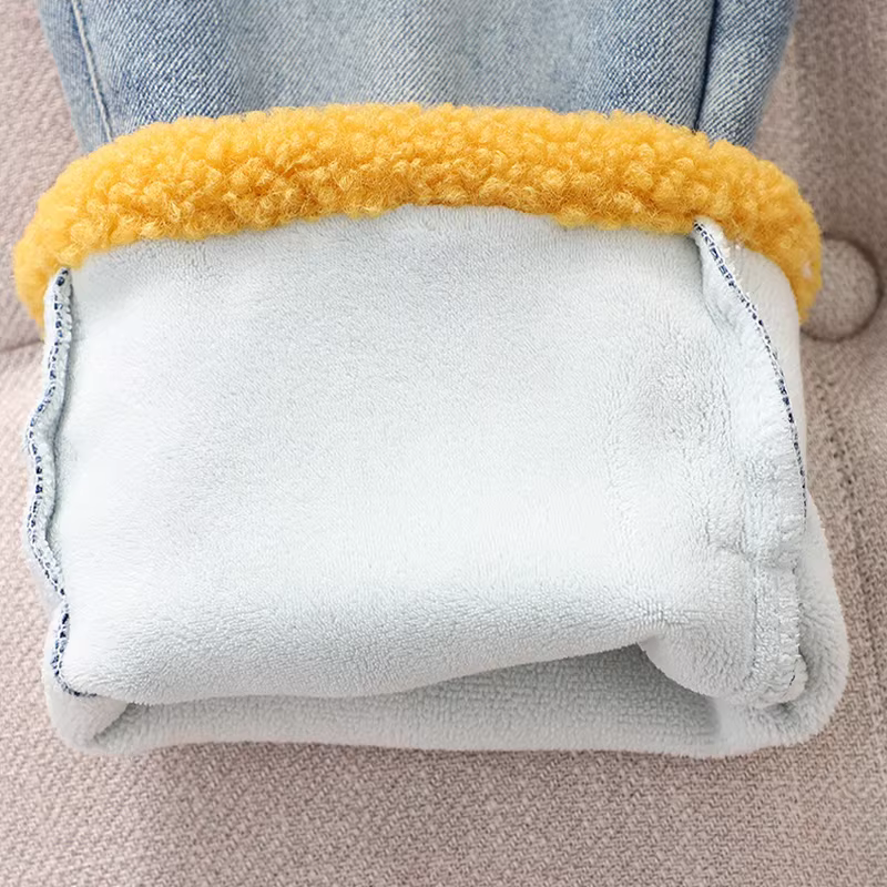 Quần jean ống đứng lót lông cừu cho bé gái, kiểu mới 2025, quần dài ôm dáng dày dặn cho trẻ em.