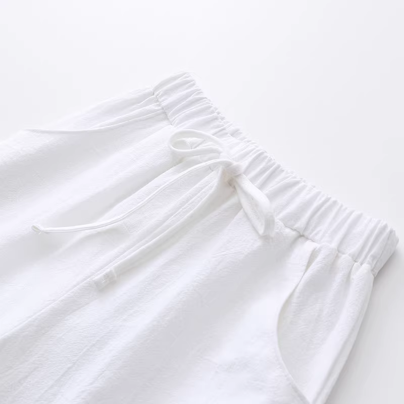 Quần short dài vừa phải cho bé gái Quần short năm điểm dành cho trẻ em mùa hè Quần vải lanh cotton trắng mùa hè quần ống rộng dài vừa phải cho trẻ em quần bảy điểm quần váy