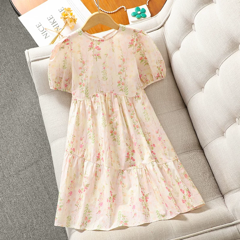 Váy hè bé gái 2025 kiểu dáng mới họa tiết hoa phong cách đồng quê chất liệu cotton size trung và lớn quần áo trẻ em váy công chúa bé gái