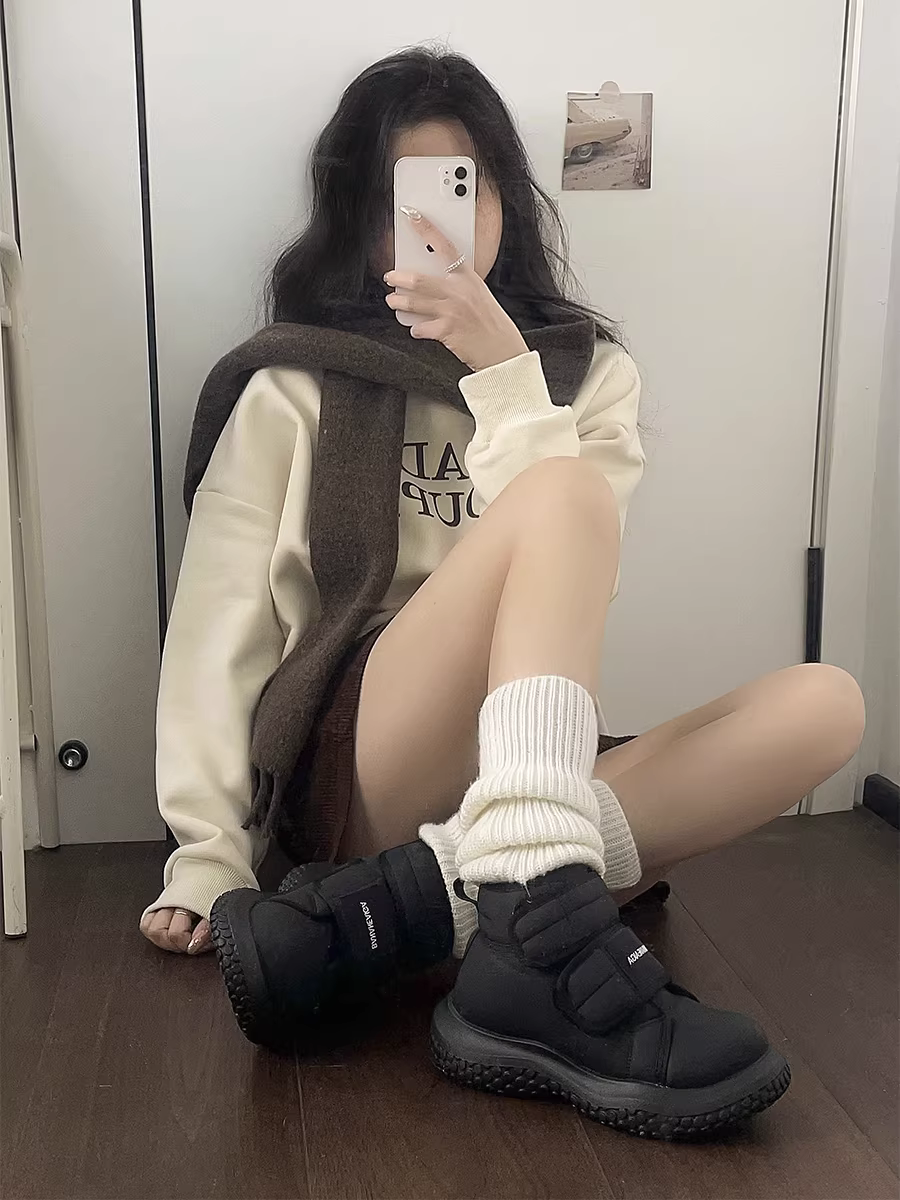 Giày bốt tuyết đen đế dày giữ ấm Nanzai dành cho nữ, mẫu mới mùa đông 2025 có khóa dán, lót lông cừu và giày cotton dày dặn.