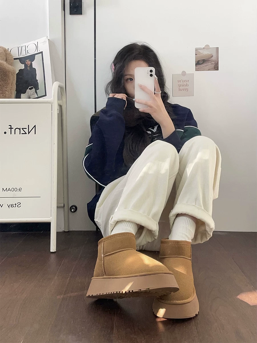 Giày bốt tuyết đế dày tích hợp lông thú ấm áp dành cho nữ, lót lông cừu mùa đông và dày dặn Giày cotton một chân Đông Bắc kiểu mới 2025