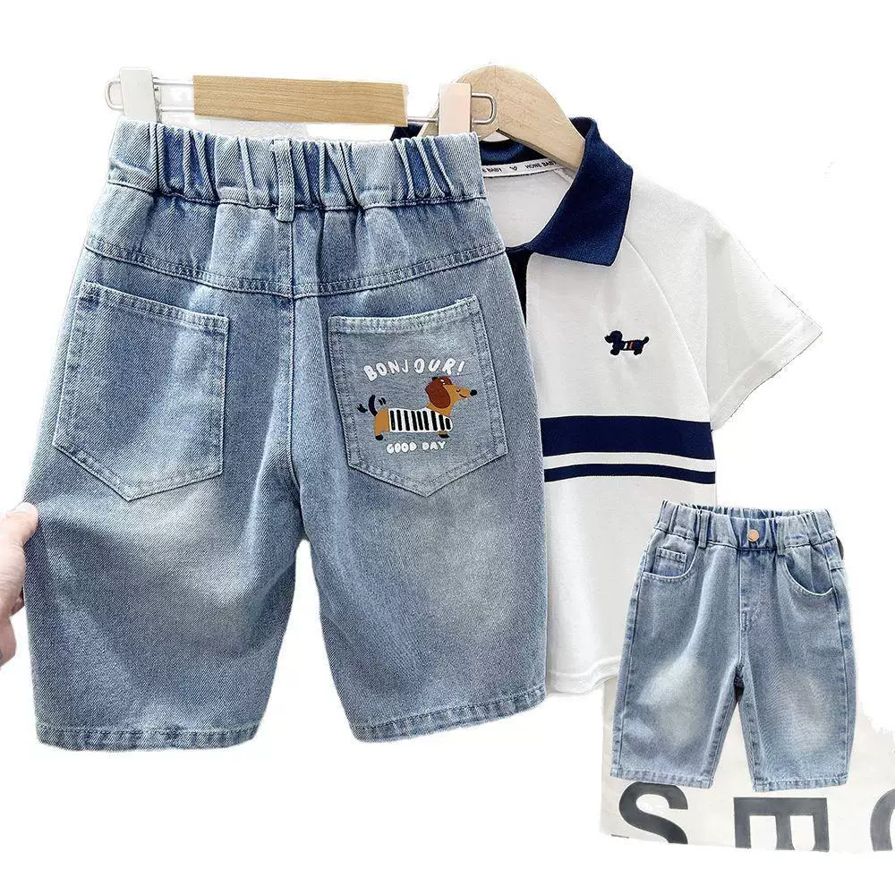 Quần jean bé trai 2025 kiểu hoạt hình mới, quần áo trẻ lớn, quần short mùa hè bé trai, quần lửng năm phần mặc ngoài trời
