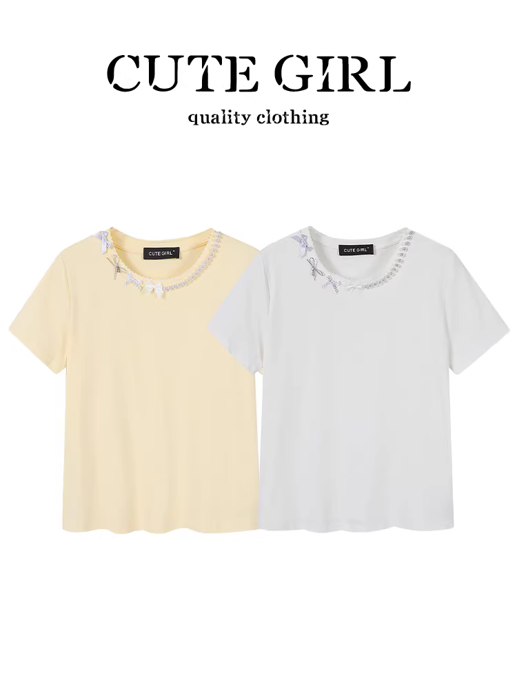 Áo thun ngắn tay thêu nơ giảm tuổi theo phong cách Hàn Quốc dành cho nữ trong mùa hè trang phục phong cách miu cổ tròn áo trễ vai