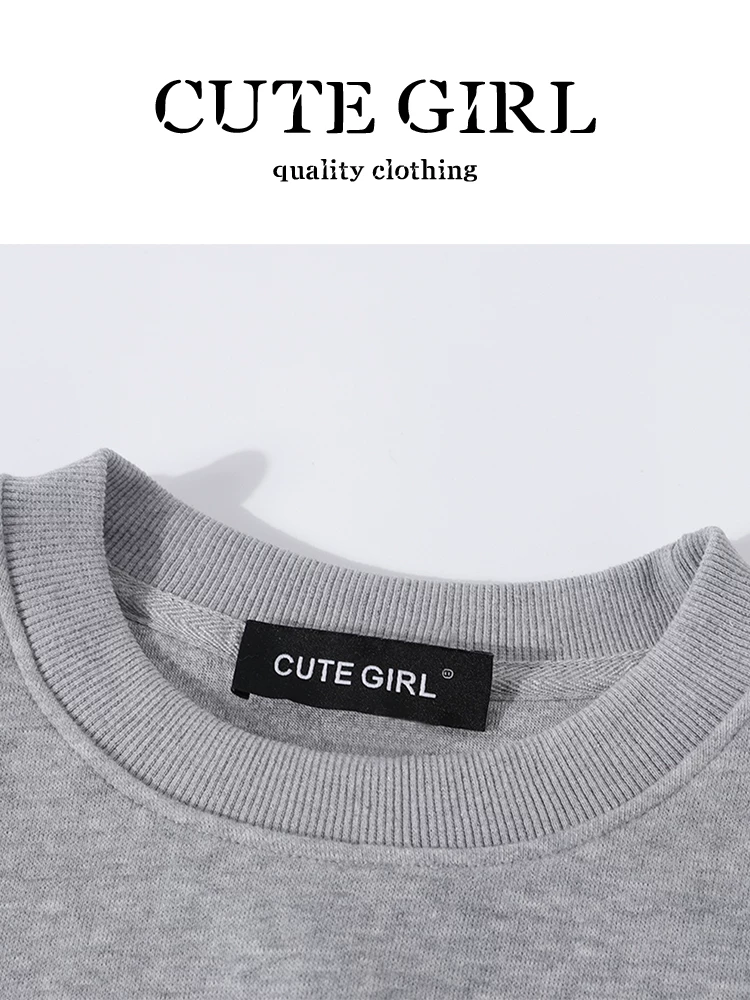 Bộ trang phục hoàn chỉnh của CuteGirl dành cho nữ mùa thu: áo len in họa tiết màu xám và chân váy dệt kim hai mảnh