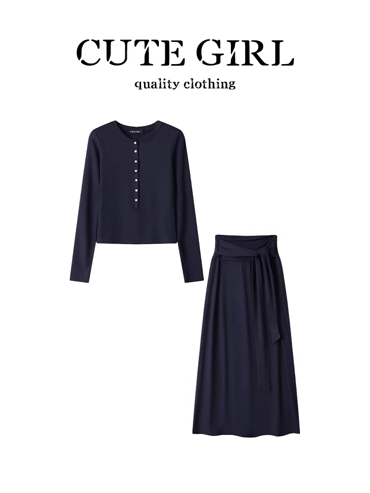 Bộ trang phục phong cách dễ thương dành cho nữ, gồm áo len dài tay màu xanh đậm và chân váy hai mảnh, thích hợp cho đầu thu.