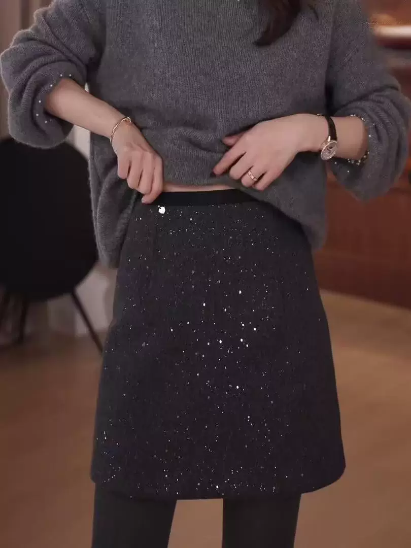 Váy len sequin bóng mượt cỡ lớn dành cho mùa thu đông, che phủ toàn thân và trông thon gọn, váy ôm hông, váy ngắn lưng cao chữ A đa năng.