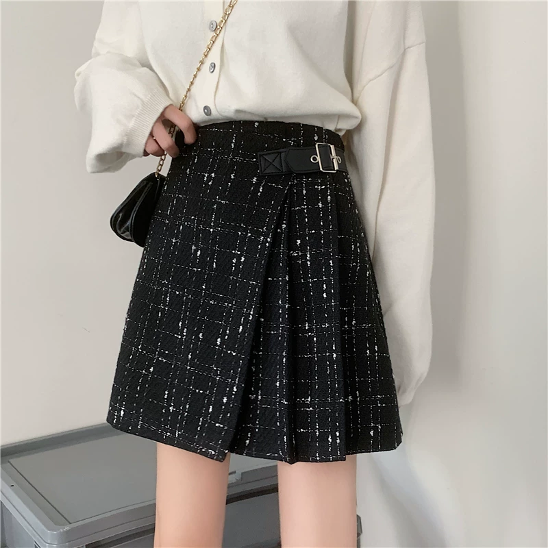 Quần váy xếp ly không đều màu đen bằng len cỡ lớn dành cho nữ, váy chữ A ôm hông lưng cao, váy ngắn mùa thu đông.