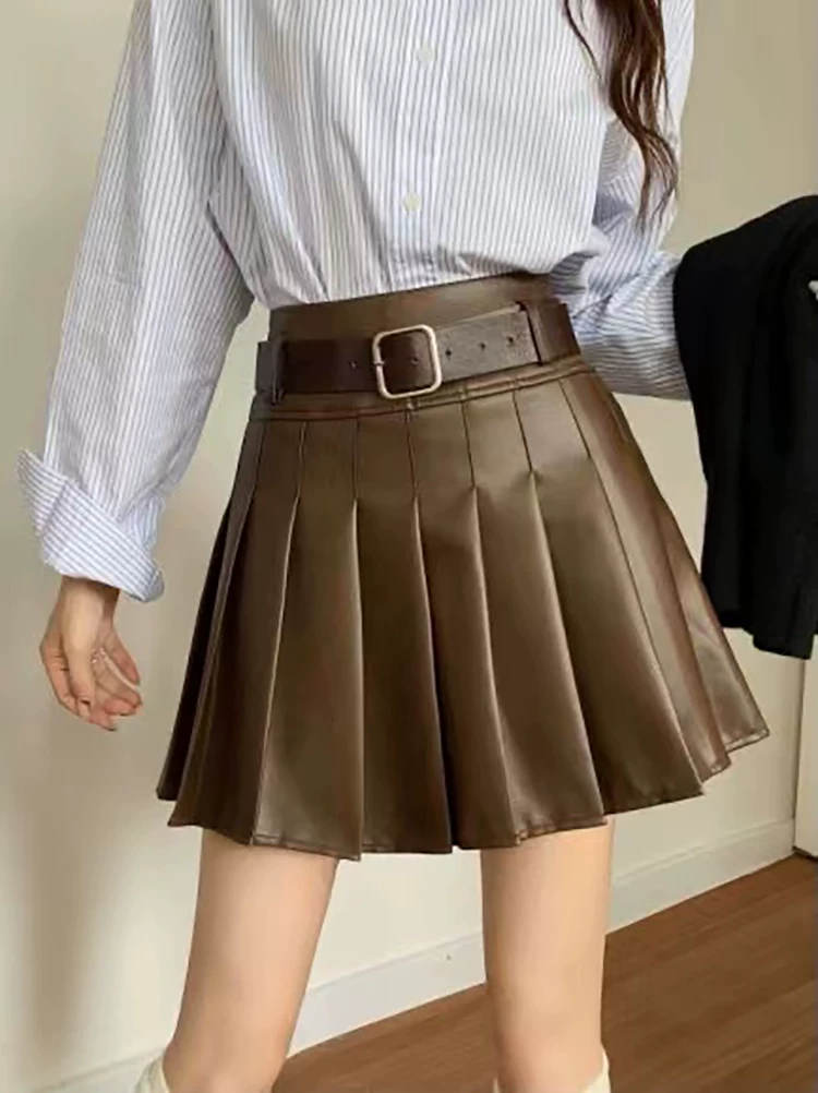 Váy da PU chữ A lưng cao, váy xếp ly, váy nửa thân nữ, váy ngắn chữ A cỡ lớn mùa thu đông hot girl, váy da mini ôm hông màu cà phê