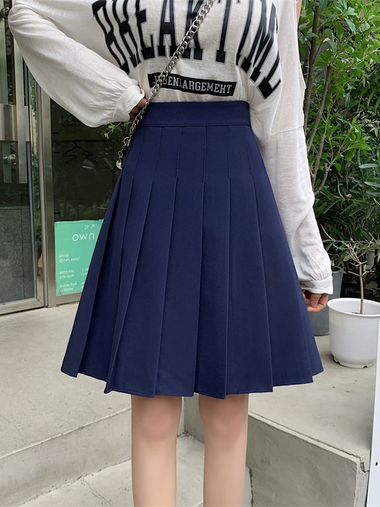 Váy xếp ly màu xanh TB dành cho nữ, váy kiểu preppy cạp cao chống lộ mùa thu đông, váy chữ A, váy nửa thân thon gọn.