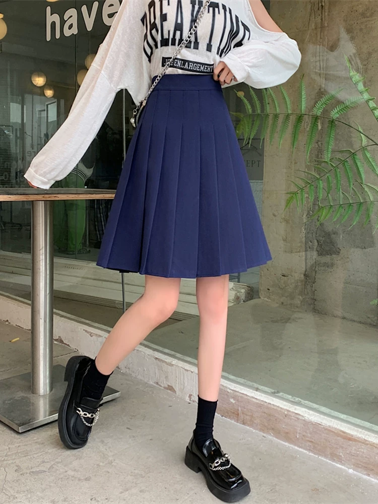 Váy xếp ly màu xanh TB dành cho nữ, váy kiểu preppy cạp cao chống lộ mùa thu đông, váy chữ A, váy nửa thân thon gọn.