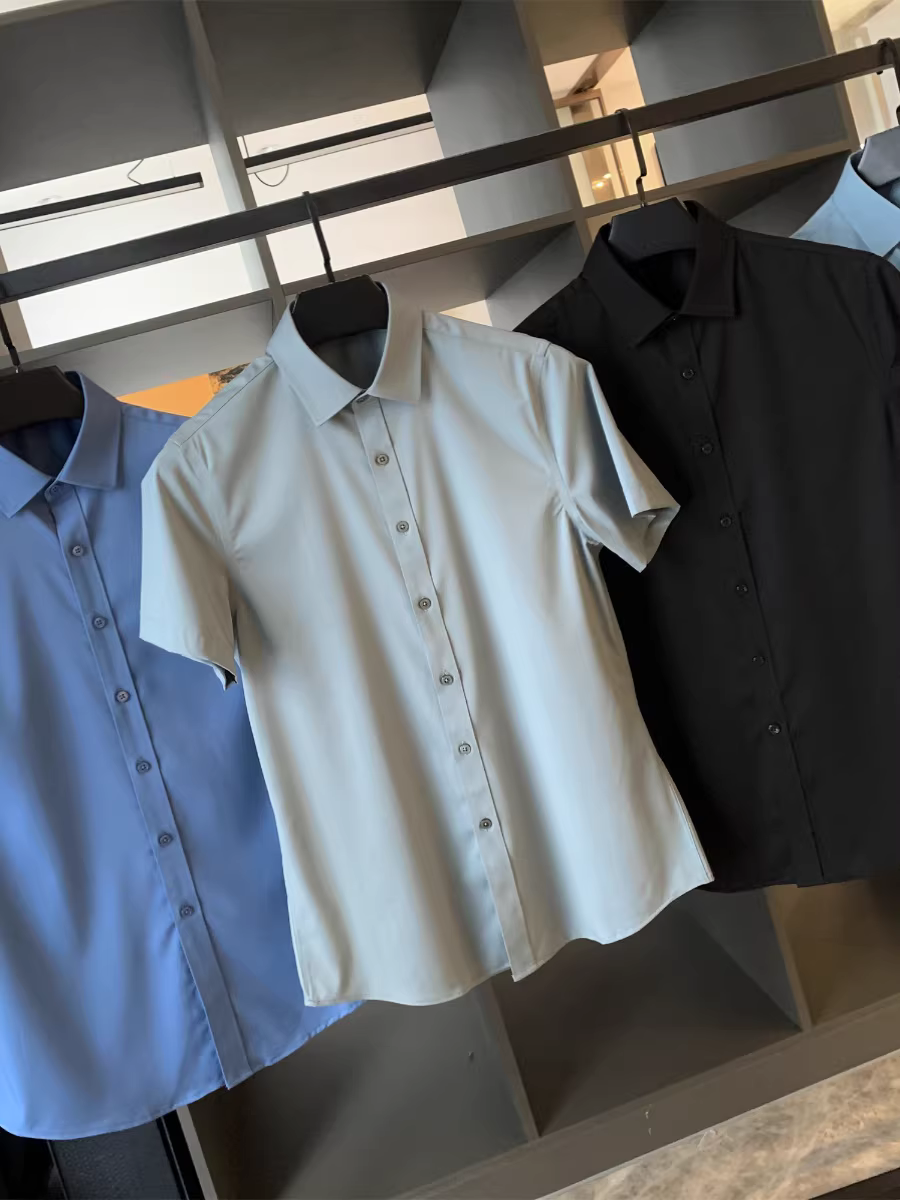 Vải kỹ thuật ba lớp chống thấm Don Quixote! Mềm mịn như lụa và chống nhăn! Áo sơ mi ngắn tay màu trơn mùa hè dành cho nam.