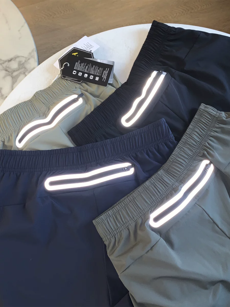 Sản phẩm thể thao ngoài trời Don Quixote! Khóa kéo dính 3M! Quần short thể thao chạy bộ nam thông thường