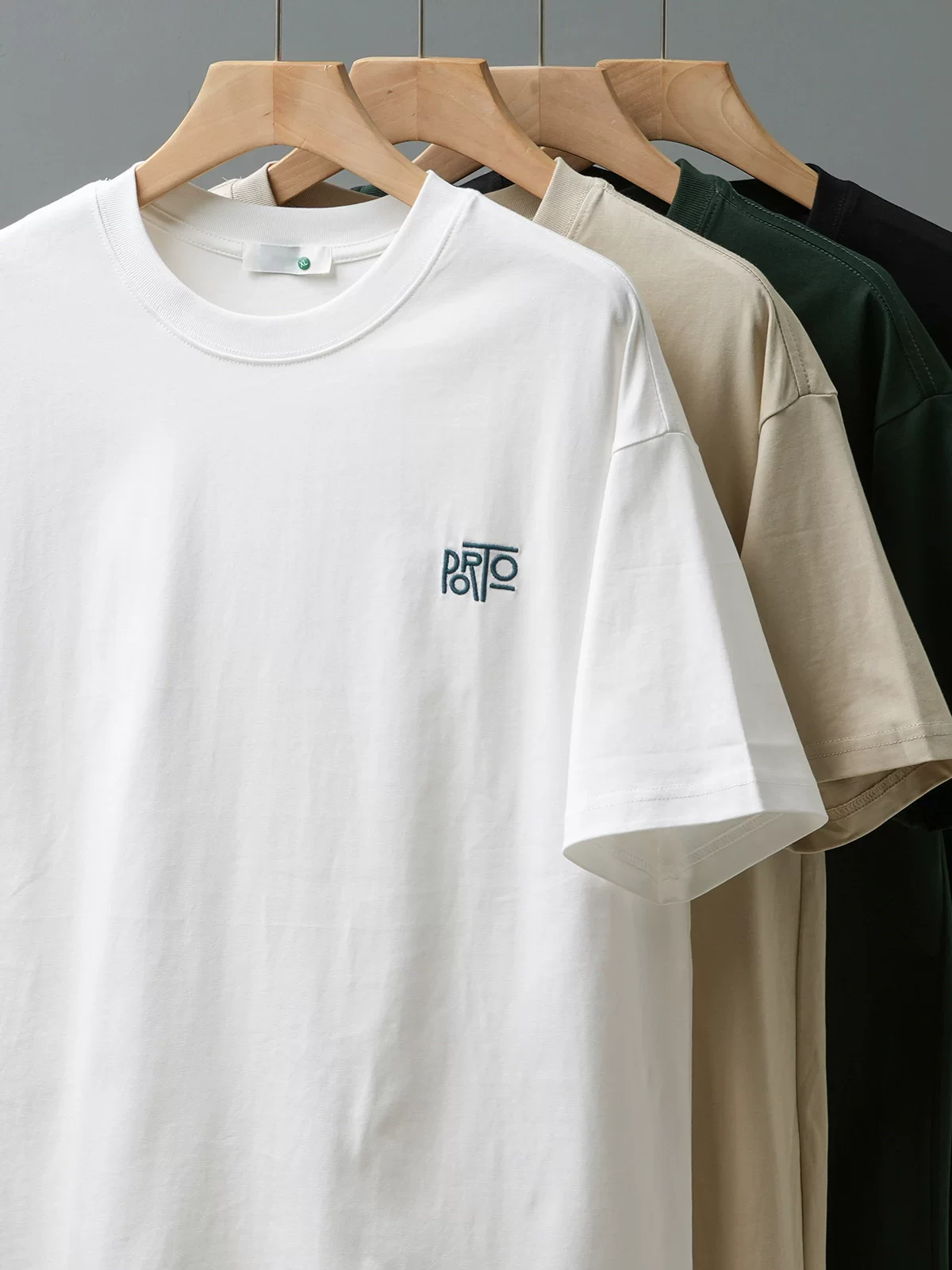 Áo thun nam OMZM kiểu Mỹ, chất liệu cotton 100% dày dặn 260g, tay ngắn, thiết kế thêu mới mùa hè 2025, dáng rộng, tay lửng.