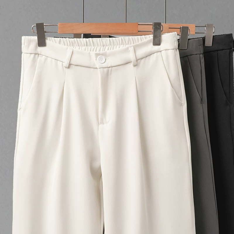 Quần âu nam dáng thẳng kiểu Mỹ OMZM, quần ống rộng dáng suông mới mùa xuân 2025, quần thể thao đa năng, phong cách thường ngày