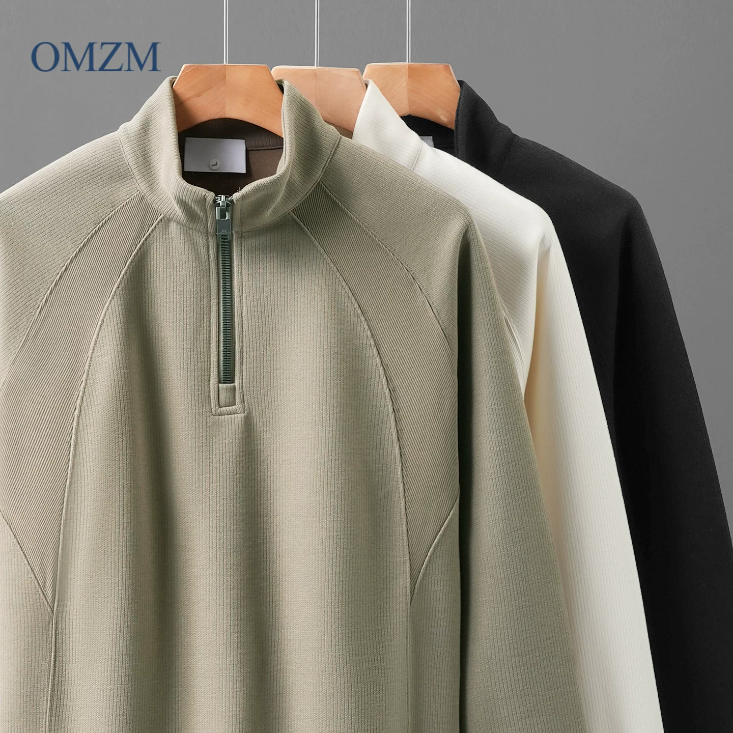 Áo nỉ cổ đứng nửa khóa kéo OMZM dành cho nam, áo sơ mi dài tay dáng rộng kiểu raglan mùa thu, áo chui đầu màu trơn phối vải chắc chắn.