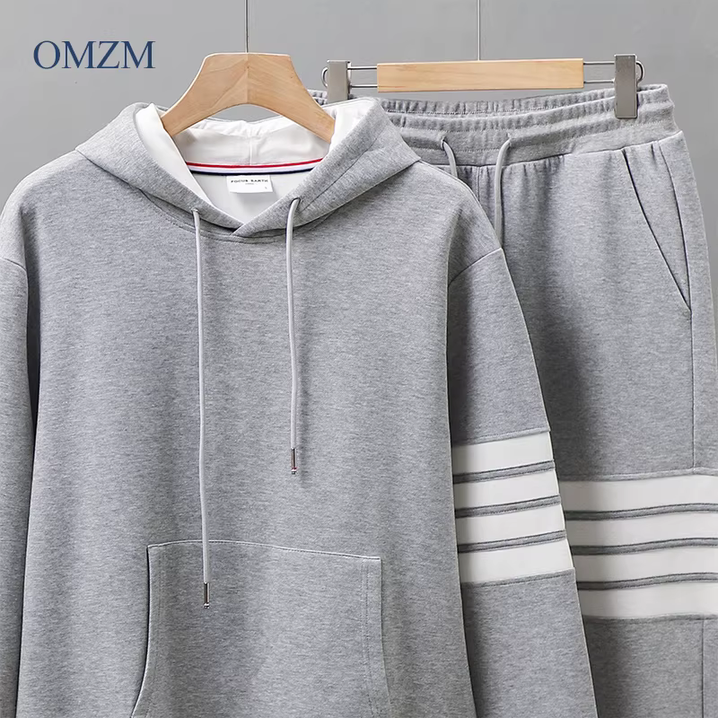 Bộ đồ thể thao hạng nặng kiểu Mỹ OMZM dành cho nam, áo nỉ có mũ trùm đầu và quần thể thao bốn sọc bằng vải cotton thoáng khí dành cho nữ