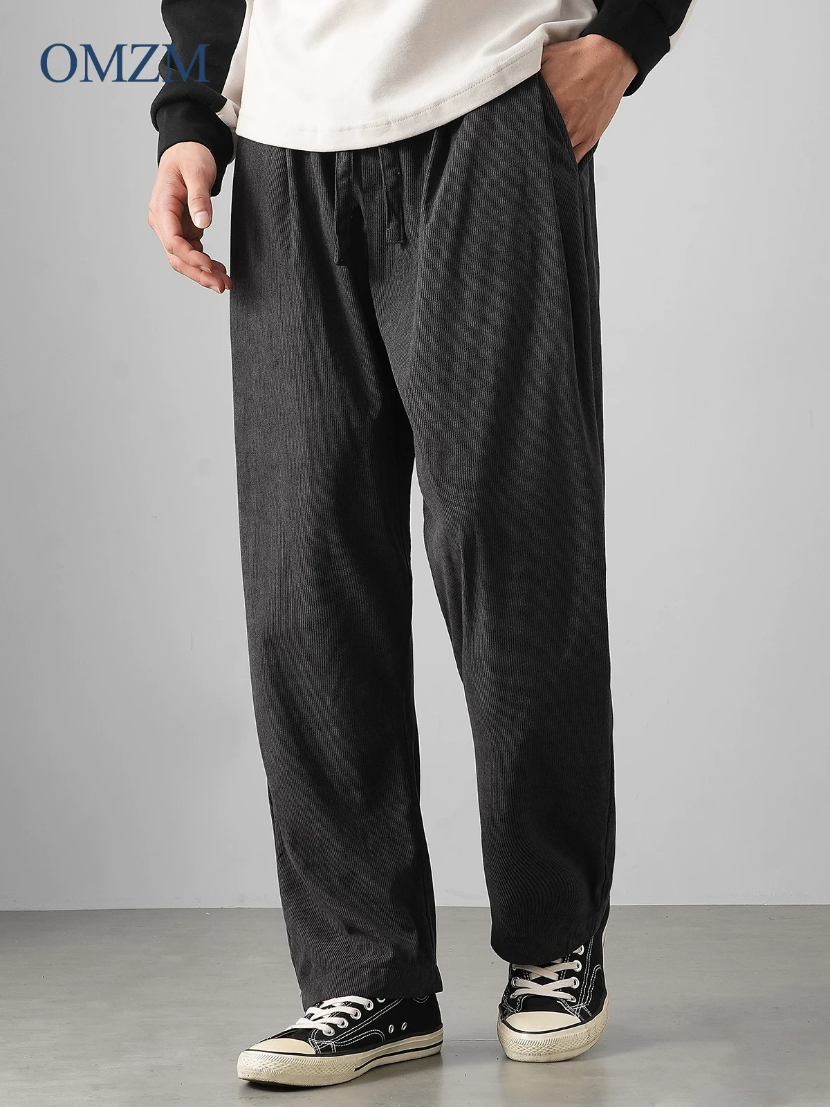Quần nhung cotton hạng nặng kiểu Âu của OMZM dành cho nam, quần ống đứng ấm áp mùa thu đông, phong cách đường phố cao cấp của Mỹ, quần ống rộng rộng rãi.