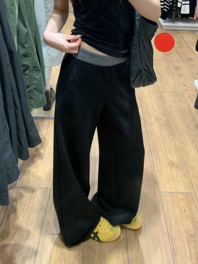 Quần thể thao nữ phối màu đen, kiểu mới xuân 2025, size lớn, cạp cao, tôn dáng, ống rộng, dài chấm đất.