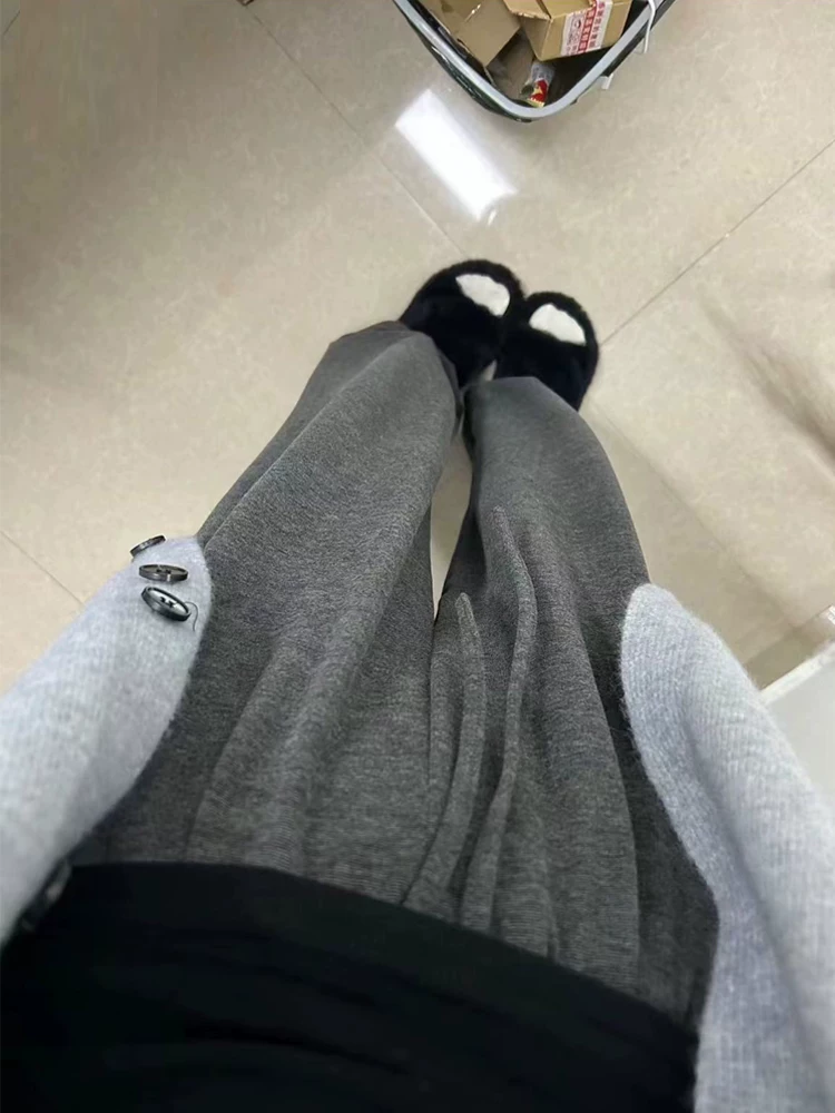 Quần ống rộng lưng cao dáng rộng cỡ lớn mùa thu dành cho nữ với hiệu ứng xếp nếp thon gọn và thoải mái, phù hợp với mọi dịp.