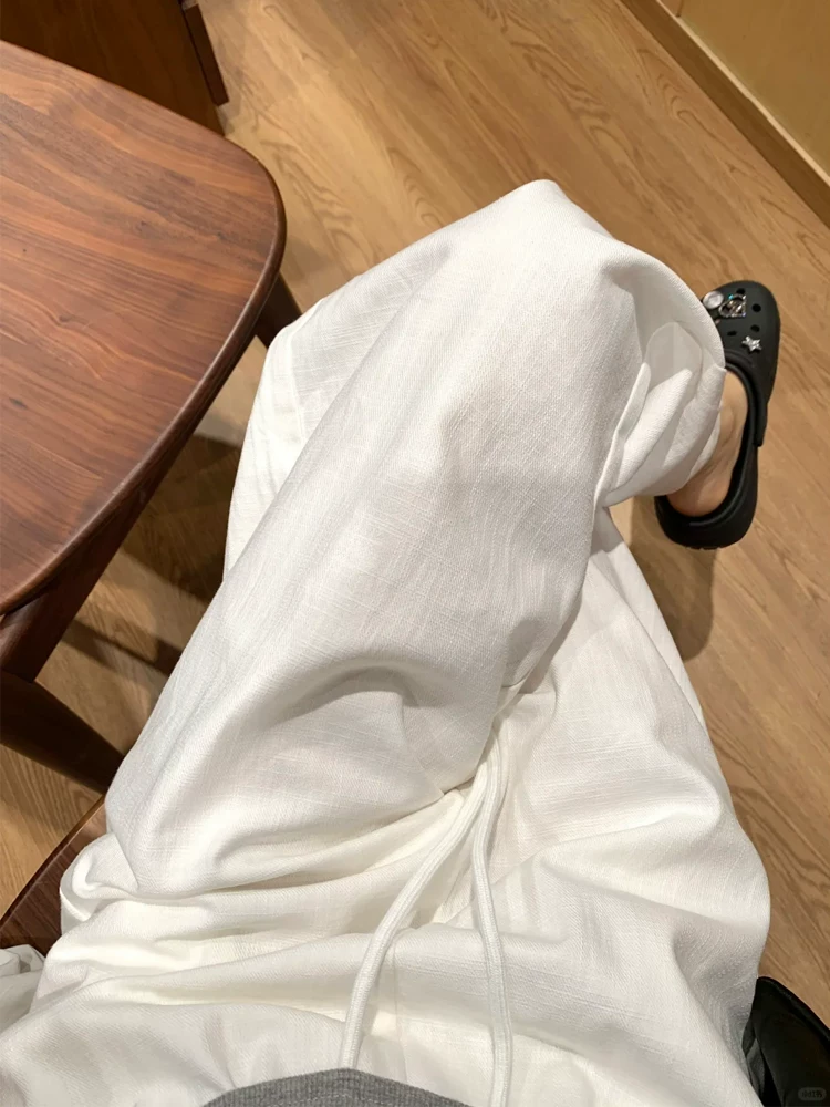 Quần thể thao màu trắng dành cho nữ, kiểu dáng mỏng mùa hè, cỡ lớn, lưng cao, dáng rộng, giảm béo, dáng quả lê, quần dài ống rộng.