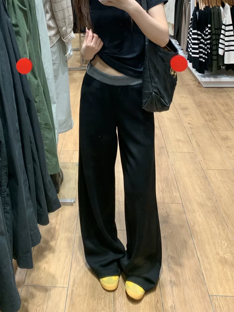 Quần thể thao nữ phối màu đen, kiểu mới xuân 2025, size lớn, cạp cao, tôn dáng, ống rộng, dài chấm đất.