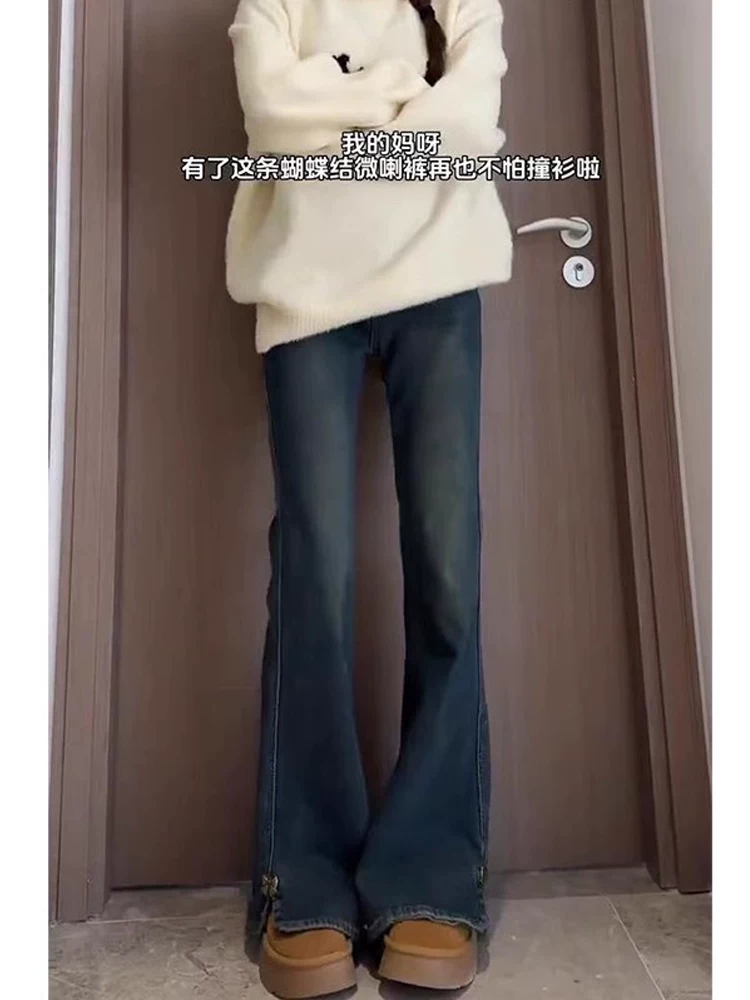 Quần jeans xanh vintage dáng loe nữ xuân 2025, size lớn, cạp cao, co giãn, che hông, tôn dáng, ống chuông, dài chạm sàn