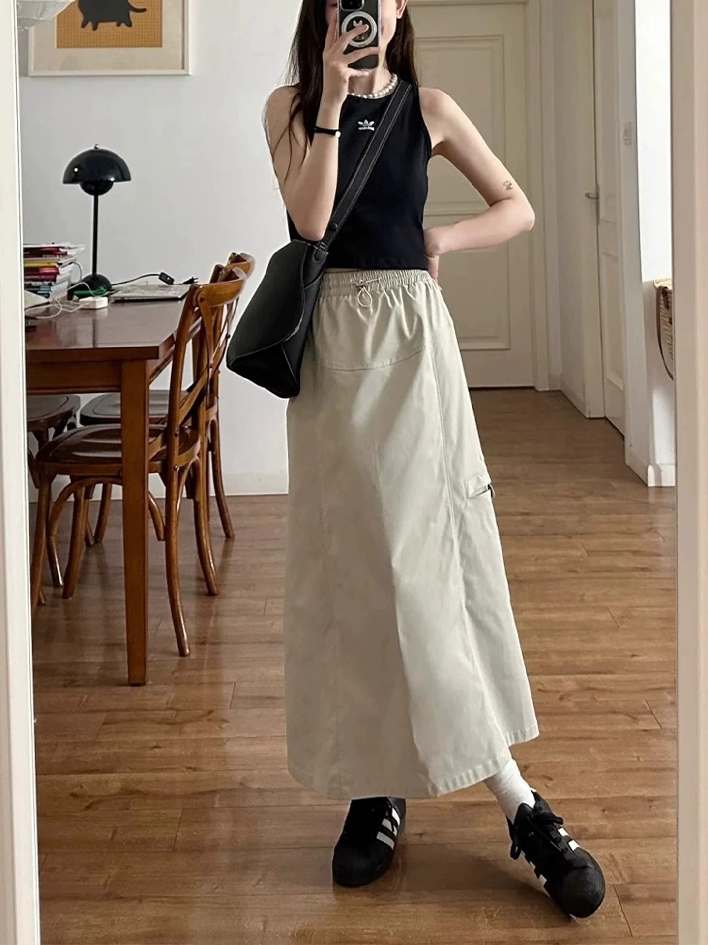 Váy công sở cổ điển kiểu Mỹ dành cho nữ, phong cách mùa hè mới, cỡ lớn, lưng cao, che hông, giảm béo, váy chữ A dài vừa phải.