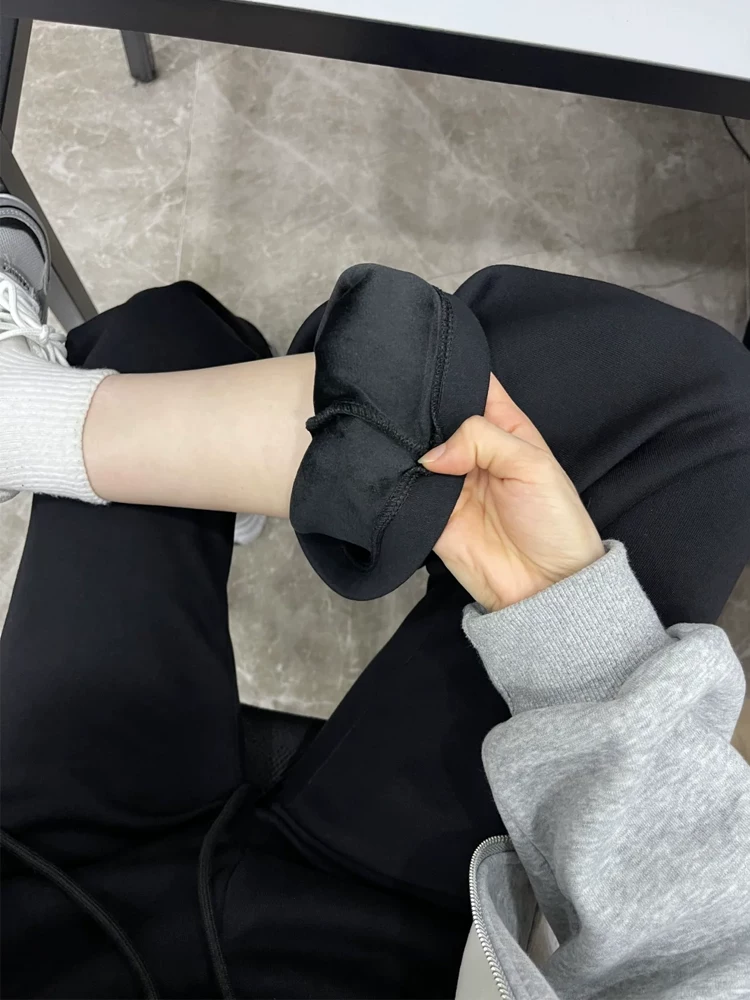 Quần ống loe dày lót lông cừu màu đen dành cho nữ, mùa thu đông, cỡ lớn, lưng cao, mềm mại, che hông, giảm béo, quần thể thao thông thường.