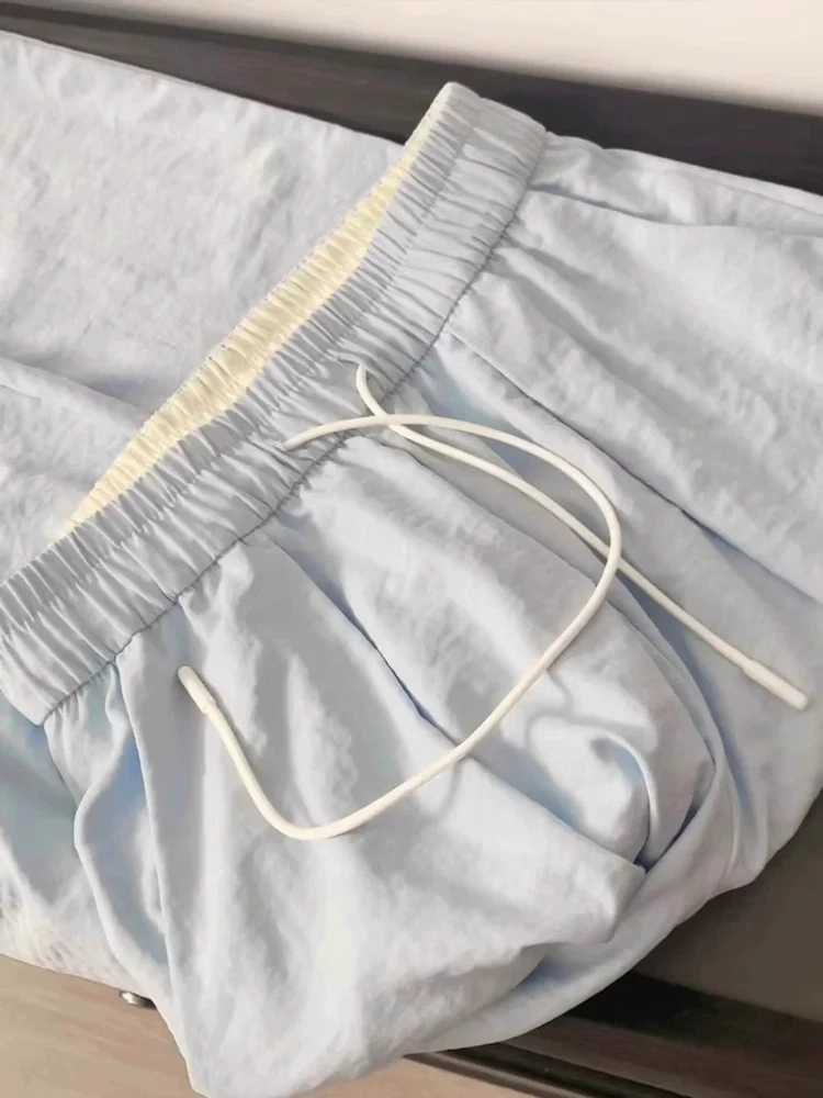 Quần màu xanh sữa dành cho nữ, kiểu dáng mùa hè mới, cỡ lớn, lưng cao, dáng rộng, xếp nếp, thon gọn, chất liệu lụa băng, quần ống rộng thông thường.