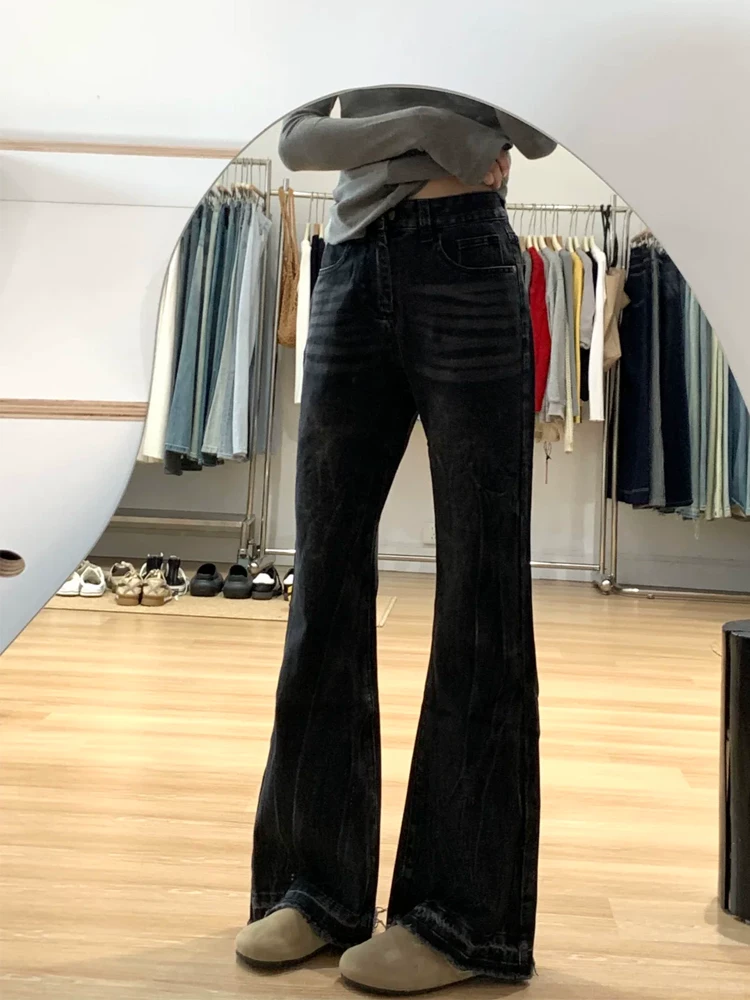 Quần jean loe nữ không bó sát chân, kiểu mới xuân 2025, size lớn, cạp cao, rộng rãi, che hông, quần chuông tôn dáng