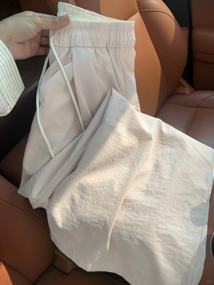 Quần suông màu hồng nữ mùa hè 2025 chất liệu mỏng, size lớn, cạp cao, dáng rộng, tôn dáng, chất liệu mát mẻ