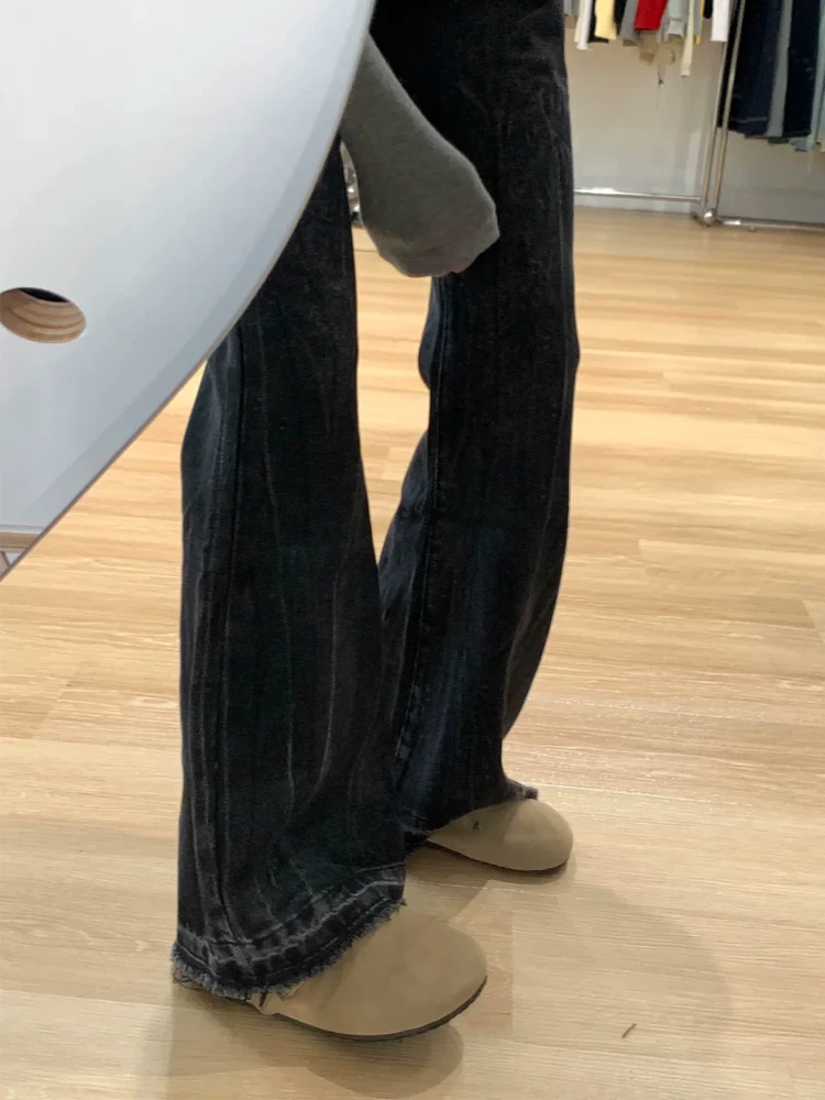 Quần jean loe nữ không bó sát chân, kiểu mới xuân 2025, size lớn, cạp cao, rộng rãi, che hông, quần chuông tôn dáng