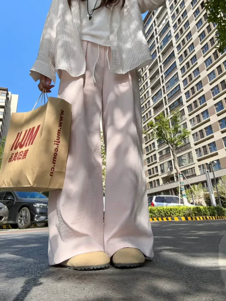 Quần suông màu hồng nữ mùa hè 2025 chất liệu mỏng, size lớn, cạp cao, dáng rộng, tôn dáng, chất liệu mát mẻ