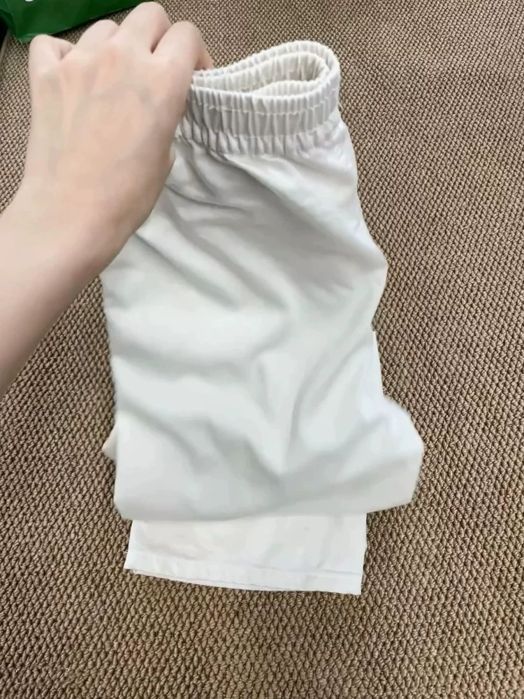 Quần jeans Tencel trắng nữ, hè 2025, kiểu dáng mỏng, size lớn, cạp cao, chất liệu mềm mại, tôn dáng, quần ống rộng chất liệu lụa đá