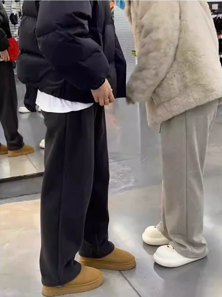 Quần thể thao dày dặn lót lông cừu dành cho nữ, kiểu dáng thu đông mới, cỡ lớn, cạp cao, che hông, dáng suôn, tôn dáng, quần ống rộng thể thao.