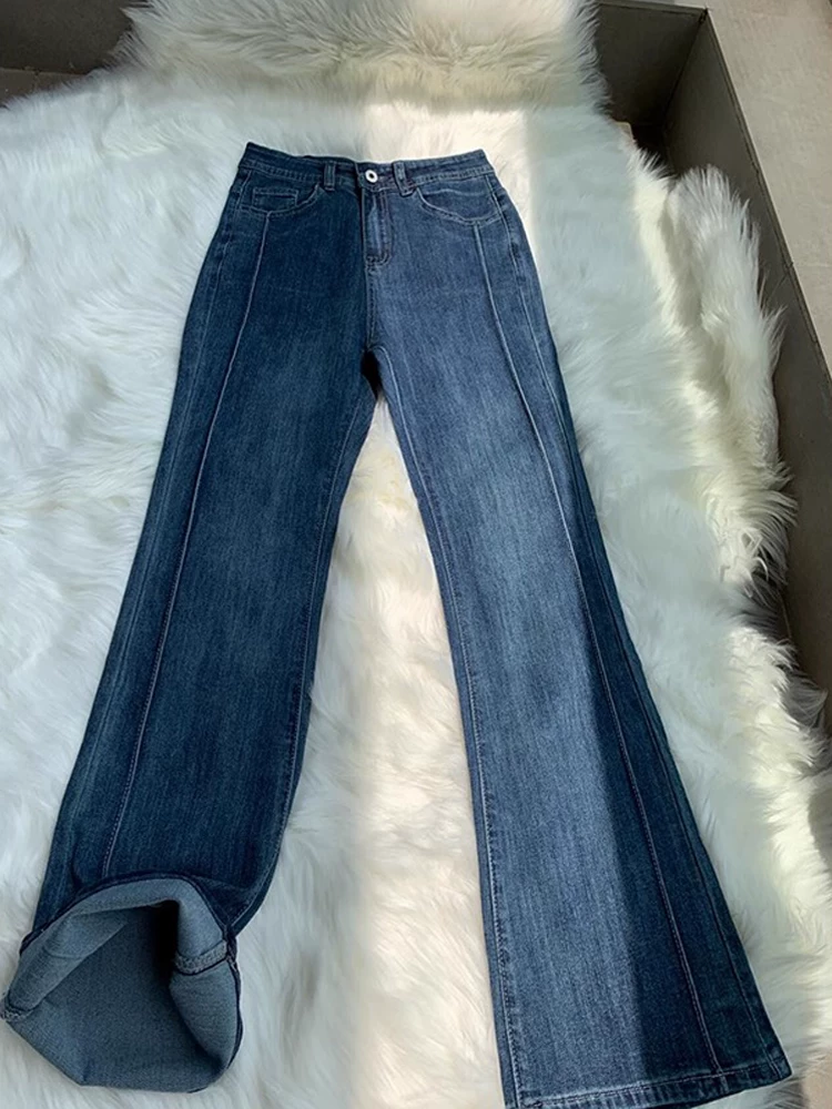 Quần jean ống loe màu xanh cổ điển dành cho nữ, kiểu dáng thu đông mới, cỡ lớn, lưng cao, co giãn, che hông, quần ống loe tôn dáng.