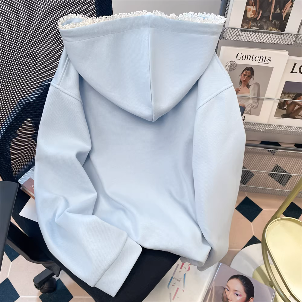 Áo len có mũ trùm đầu viền ren độc đáo và đẹp mắt theo phong cách Hàn Quốc dành cho nữ, phong cách rộng rãi và lười biếng vào đầu mùa xuân, áo khoác cardigan cài khuy màu xanh sữa.