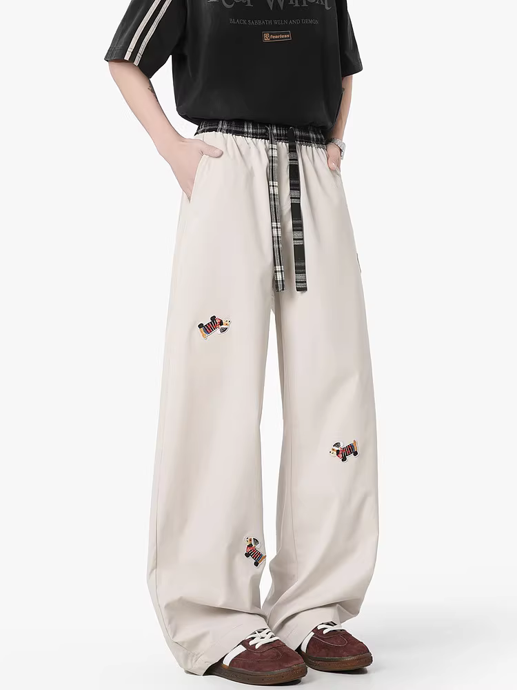 Wukong có sẵn quần dài kẻ sọc thêu hình chó theo phong cách Mỹ thời thượng dành cho nam, quần dài đa năng kiểu dáng rộng rãi cổ điển dành cho cặp đôi.