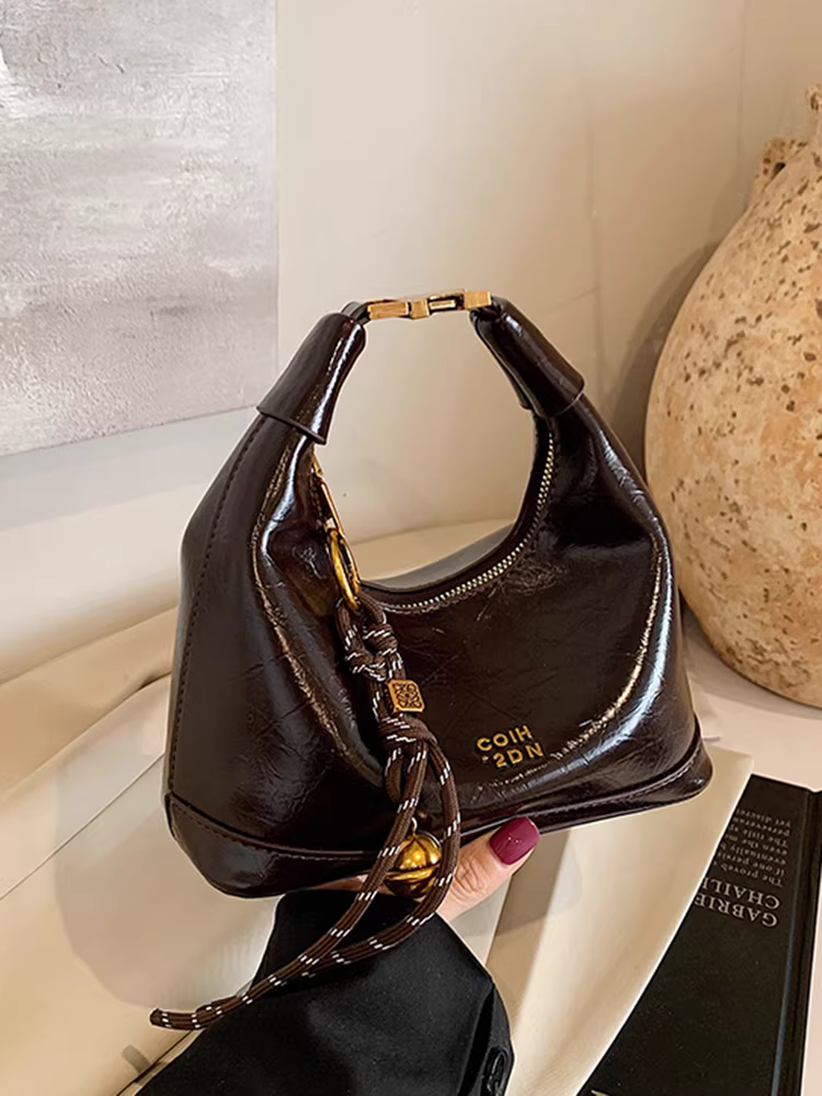 Túi đeo chéo Ankora màu đỏ dành cho nữ, mẫu mới thu đông 2025, thiết kế độc đáo, túi xách nữ kiểu bánh bao.