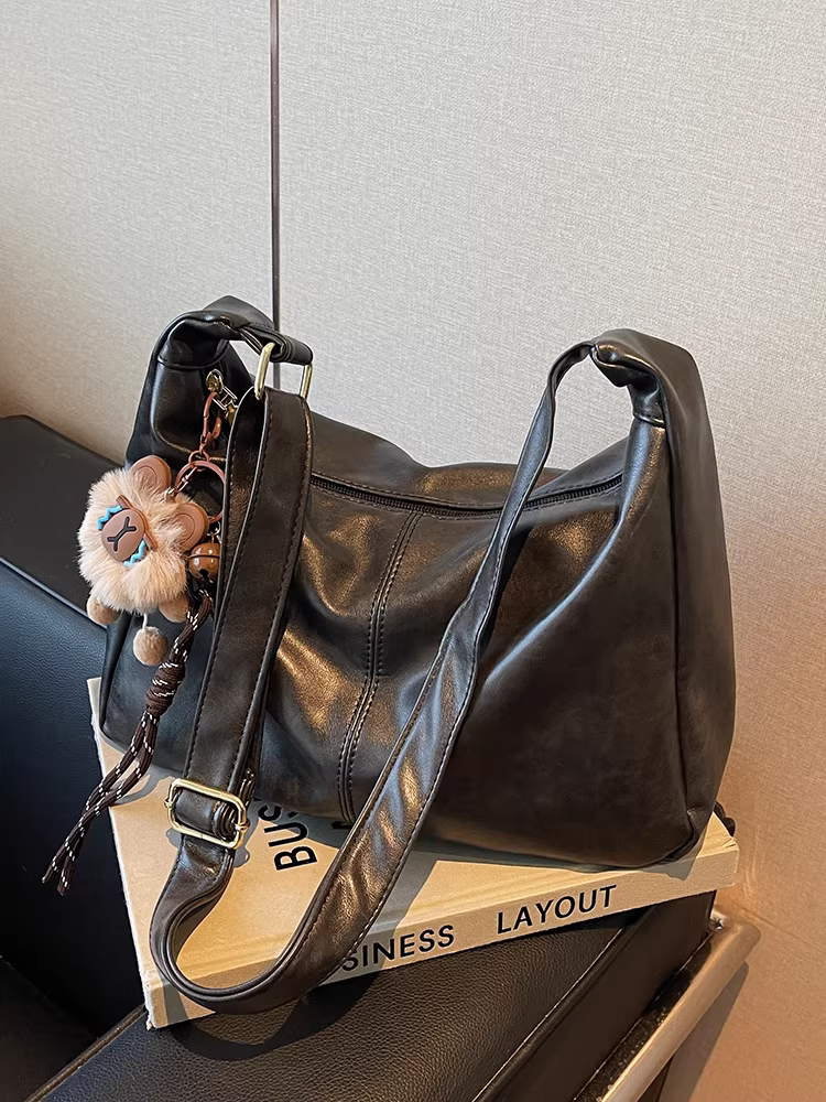 Túi xách nữ cỡ lớn, kiểu mới thu đông 2025, đa năng, đơn giản, đeo vai/chéo, phong cách retro giản dị, thích hợp đi làm.